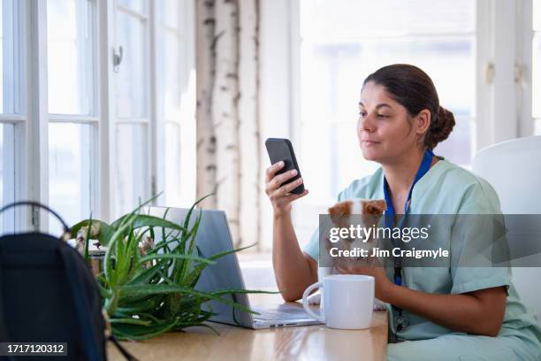 métis medical professional at home - métis stock pictures, royalty-free photos & images