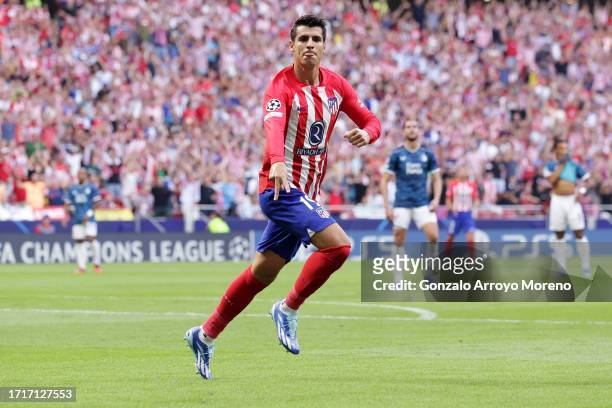Alvaro Morata of Atletico Madrid celebrates after scoring the team's first goal during the UEFA Champions League match between Atletico Madrid and...