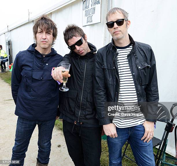 Gem Archer, Liam Gallagher and Andy Bell of Beady Eye pose backstage at day 2 of the 2013 Glastonbury Festival at Worthy Farm on June 28, 2013 in...