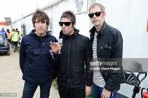 Gem Archer, Liam Gallagher and Andy Bell of Beady Eye pose backstage at day 2 of the 2013 Glastonbury Festival at Worthy Farm on June 28, 2013 in...