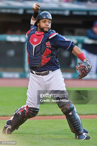 Catcher Carlos Santana of the Cleveland Indians throws to first during the third inning against the Washington Nationals at Progressive Field on June...