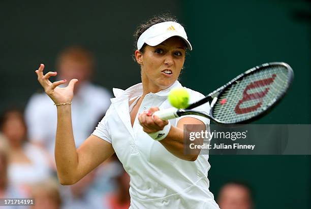 Laura Robson of Great Britain hits a forehand during her Ladies' Singles second round match against Mariana Duque-Marino of Colombia on day five of...