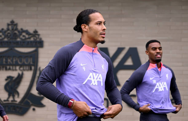 Ryan Gravenberch and Virgil van Dijk captain of Liverpool during a training session at AXA Training Centre on October 04, 2023 in Kirkby, England.