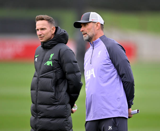 Jurgen Klopp manager of Liverpool and Pepijn Lijnders assistant manager of Liverpool during a training session at AXA Training Centre on October 04,...