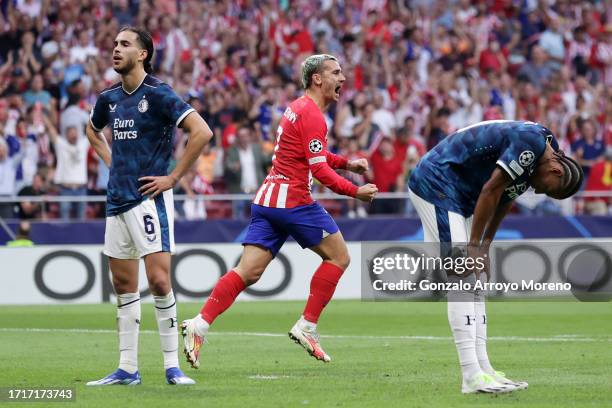 Antoine Griezmann of Atletico Madrid celebrates after scoring the team's second goal to equalise during the UEFA Champions League match between...