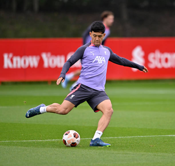 Wataru Endo of Liverpool during a training session at AXA Training Centre on October 04, 2023 in Kirkby, England.