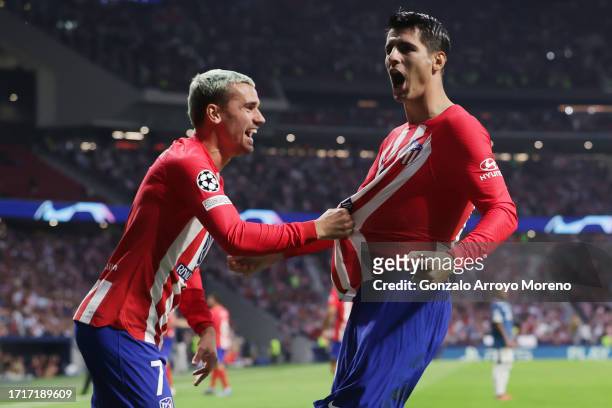 Alvaro Morata of Atletico Madrid celebrates with Antoine Griezmann of Atletico Madrid after scoring the team's third goal during the UEFA Champions...