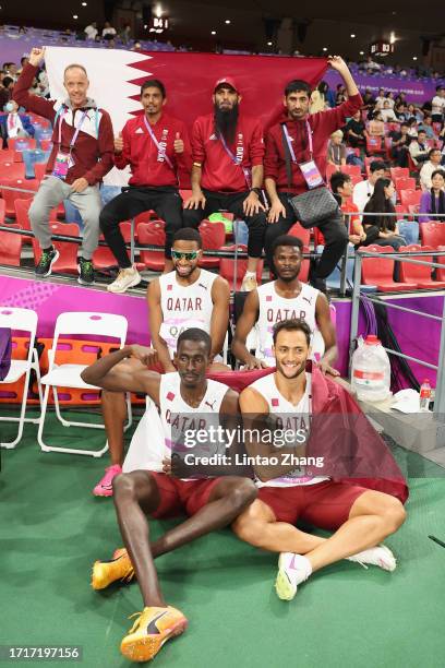 Team of Qatar rests after competes in the Men's 4 x 400m relay final athletics event during the 2022 Asian Games at Hangzhou Olympic Sports Centre on...