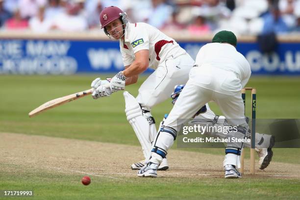 Nick Compton of Somerset looks back as he is trapped lbw off the bowling of Nathan Lyon of Australia during day three of the Somerset versus...