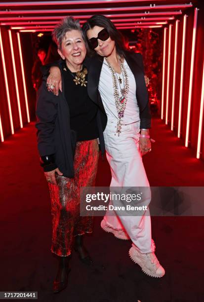 Maria Luisa Frisa and Es Devlin attend the Gucci Cosmos evening Vernissage at 180 The Strand on October 10, 2023 in London, England.