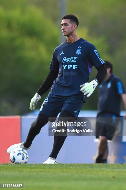 Juan Musso of Argentina drives the ball during a training session ahead of a Qualifier match against Paraguay at Lionel Messi Training Camp on...