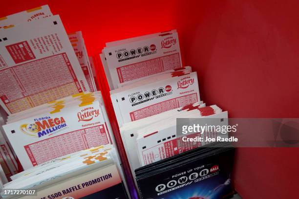 Forms to pick numbers for Powerball are on display in a store on October 04, 2023 in Miami, Florida. Wednesday's Powerball drawing will be an...