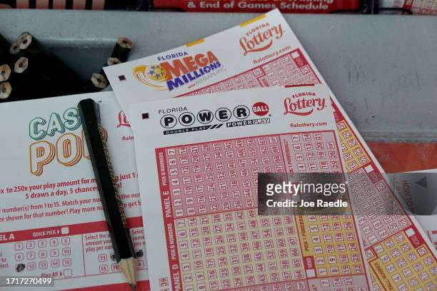 Forms to pick numbers for Powerball are on display in a store on October 04, 2023 in Miami, Florida. Wednesday's Powerball drawing will be an...