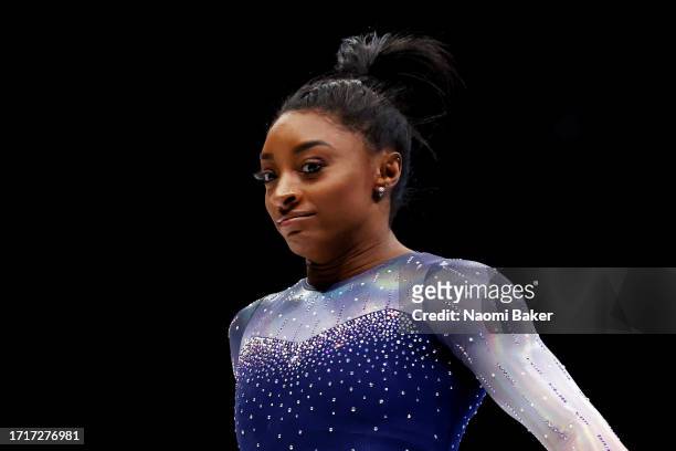 Simone Biles of Team United States looks on after her routine on Balance Beam during the Women's Team Final on Day Five of the 2023 Artistic...