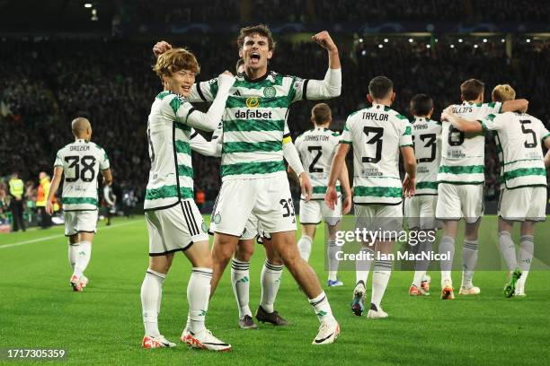 Kyogo Furuhashi of Celtic celebrates with teammate Matt O'Riley after scoring the team's first goal during the UEFA Champions League match between...