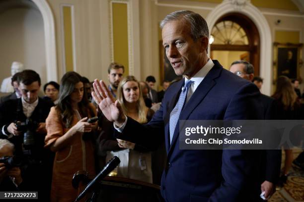 Senate Minority Whip John Thune talks to reporters following the Senate Republican policy luncheon at the U.S. Capitol on October 04, 2023 in...