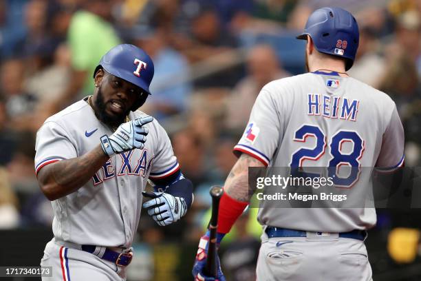 Why Texas Rangers should consider signing Jonah Heim, Adolis Garcia to long-term contract extensions