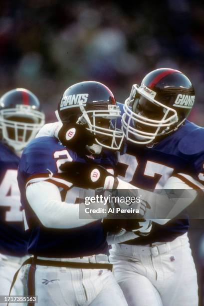 Cornerback Phillippi Sparks of the New York Giants celebrates a stop in the game between the New England Patriots vs the New York Giants on December...