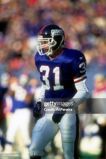 Cornerback Jason Sehorn of the New York Giants follows the action in the game between the New England Patriots vs the New York Giants on December 21....