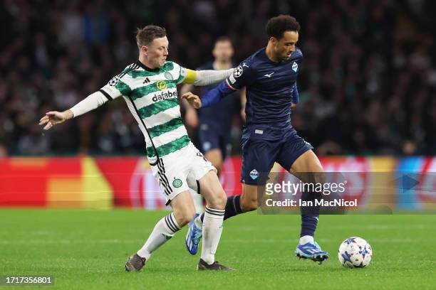 Felipe Anderson of SS Lazio is challenged by Callum McGregor of Celtic during the UEFA Champions League match between Celtic FC and SS Lazio at...