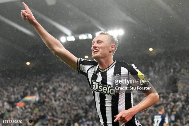Sean Longstaff of Newcastle United celebrates after scoring the team's third goal during the UEFA Champions League match between Newcastle United FC...