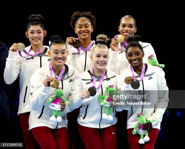 Gold medalists of Team United States pose for a photo during the medal ceremony for the Women's Team Final on Day Five of the 2023 Artistic...