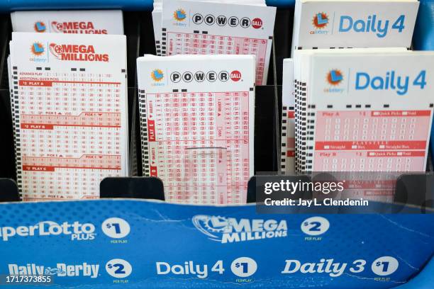 Hawthorne, CA Powerball and California Lottery games on display at Blue Bird Liquor in Hawthorne, CA, Tuesday, Oct. 10, 2023. The estimated jackpot...