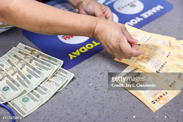 Hawthorne, CA Most people paid cash for their Powerball plays, but debit cards are also accepted at Blue Bird Liquor in Hawthorne, CA, Tuesday, Oct....