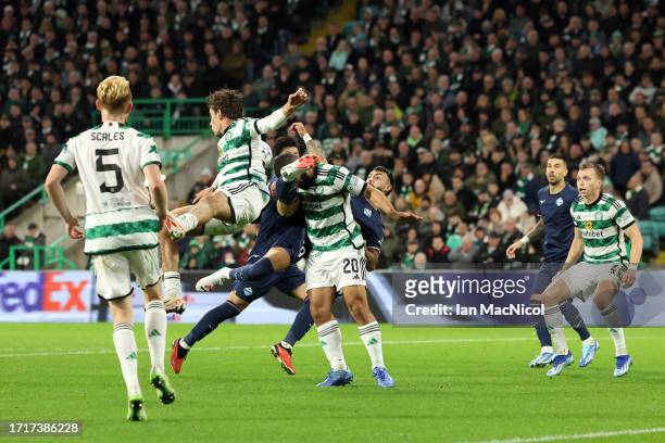 Cameron Carter-Vickers of Celtic is challenged by Valentin Castellanos of SS Lazio during the UEFA Champions League match between Celtic FC and SS...