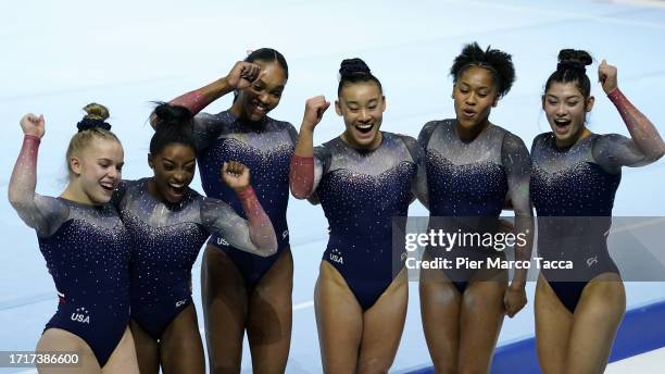 Team of United States, Joscelyn Roberson, Simone Biles, Shilese Jones, Wong, Skye Blakely and Kayla di Cello celebrate their Gold Medals after the...