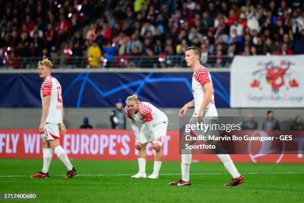 Nicolas Seiwald, Xaver Schlager, Lukas Klostermann of Leipzig looks dejected after 2nd goal against Leipzi during the UEFA Champions League match...