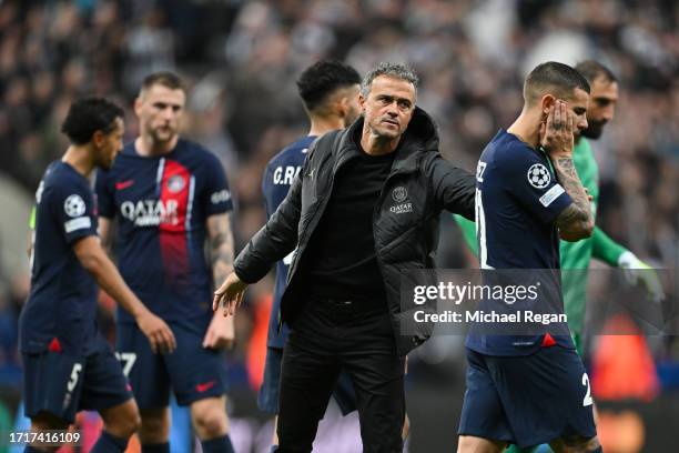 Luis Enrique, Manager of Paris Saint-Germain, consoles Lucas Hernandez of Paris Saint-Germain during the UEFA Champions League match between...