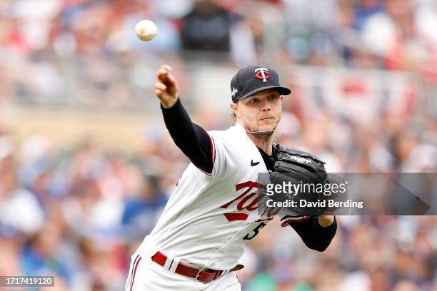 Sonny Gray of the Minnesota Twins throws out Daulton Varsho of the Toronto Blue Jays at first base during the second inning in Game Two of the Wild...