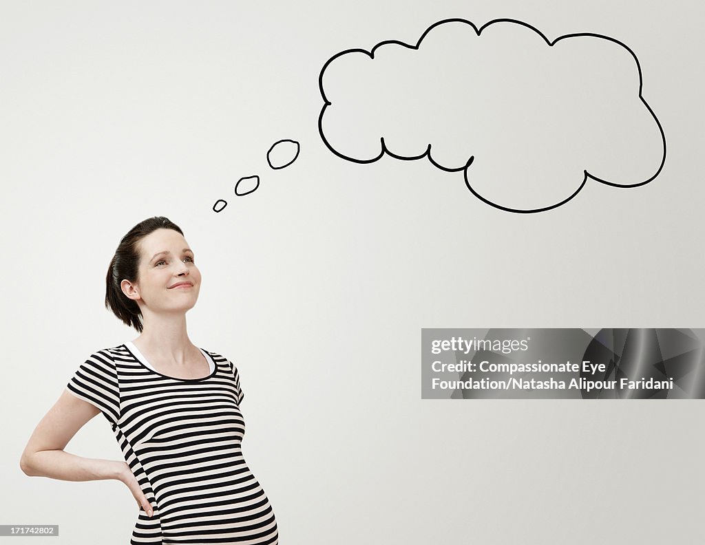 Pregnant woman in striped dress and thought bubble