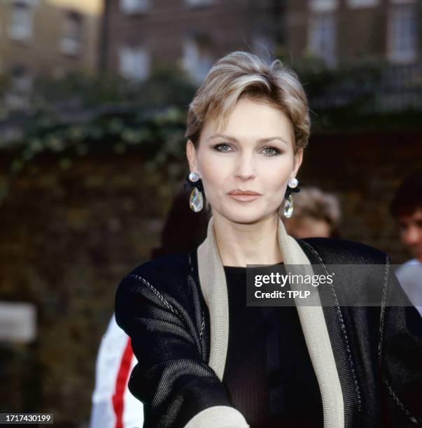 Portrait of British actress Fiona Fullerton as she poses outdoors, London, England, June 14, 1985.