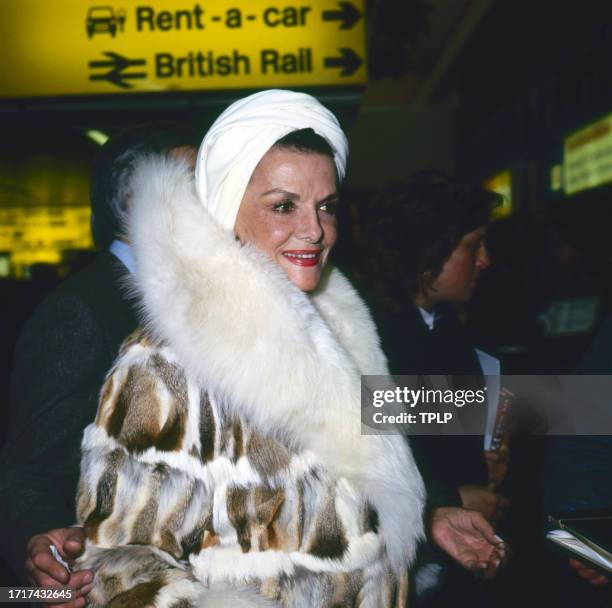 View of American actress Jane Russell at an airport, London, England, March 1, 1986.