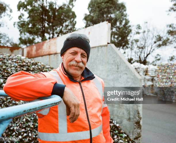 man at recycling centre - real people australia stock pictures, royalty-free photos & images