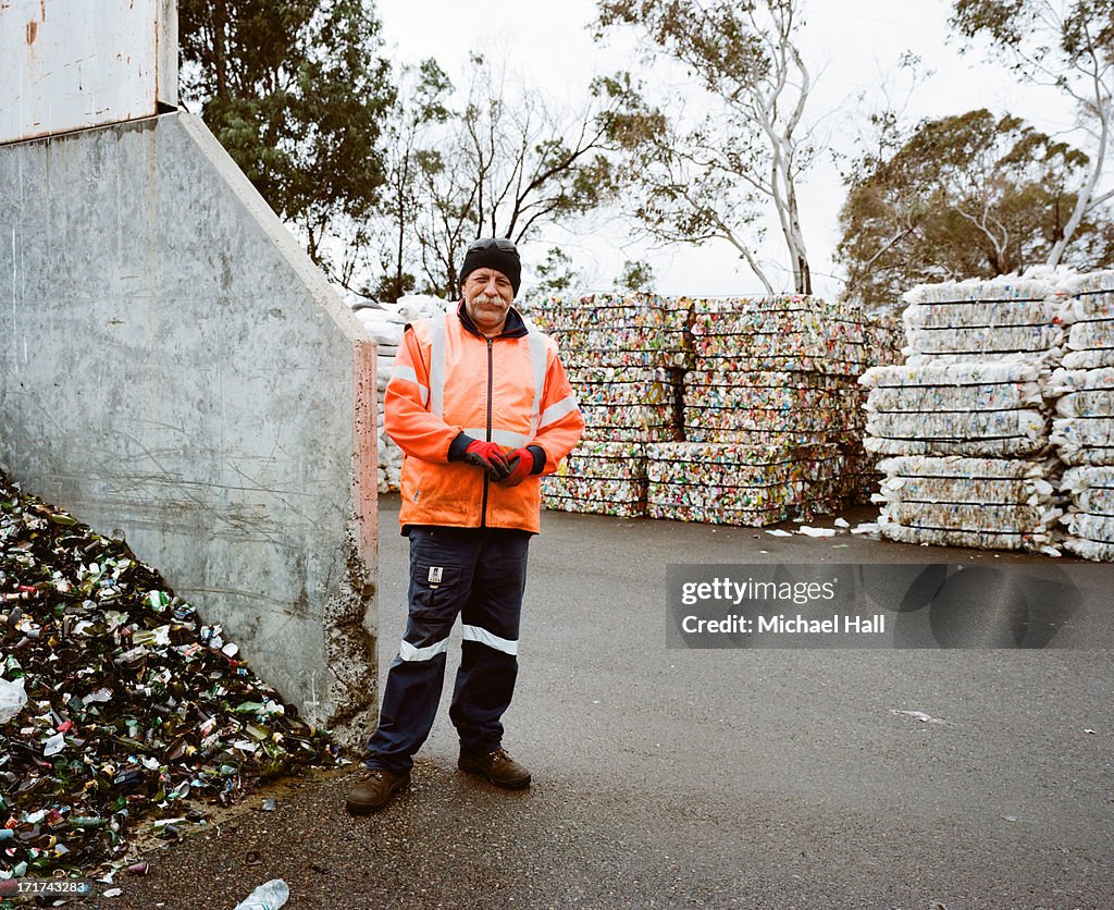 Man at recycling centre