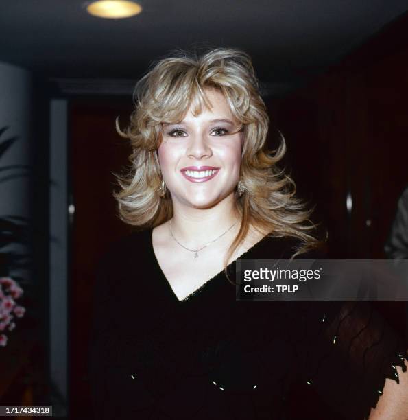 Portrait of British fashion model and Pop singer Samantha Fox as she attends an unspecified event, London, England, March 4, 1986.