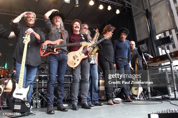 John Cowan, Patrick Simmons, Tom Johnston, Marc Russo, John McFee and Tony Pia of the Doobie Brothers perform during "FOX & Friends" All American...