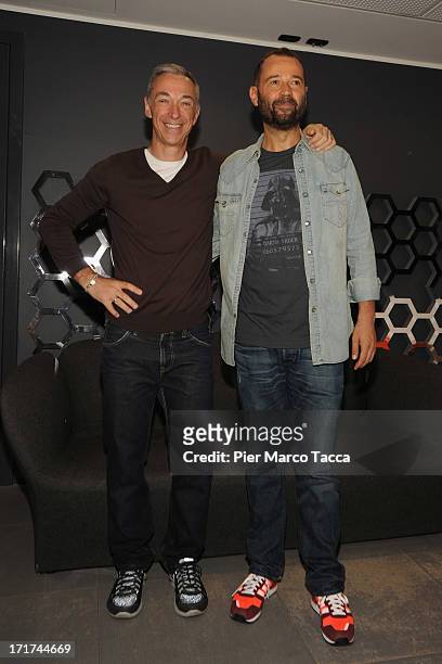 Dj Linus and Fabio Volo attend the 'Volo Is Back' photocall and press conference on June 28, 2013 in Milan, Italy.