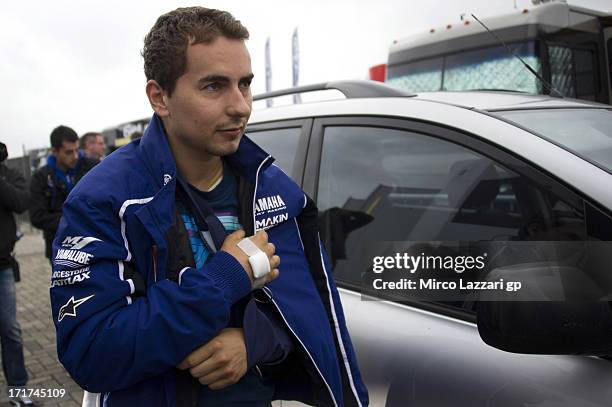 Jorge Lorenzo of Spain and Yamaha Factory Racing returns to paddock after an operation on his collarbone, which he broke during yesterday's free...