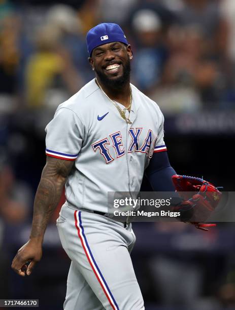 Adolis Garcia of the Texas Rangers celebrates after defeating the Tampa Bay Rays 7-1in Game Two of the Wild Card Series at Tropicana Field on October...