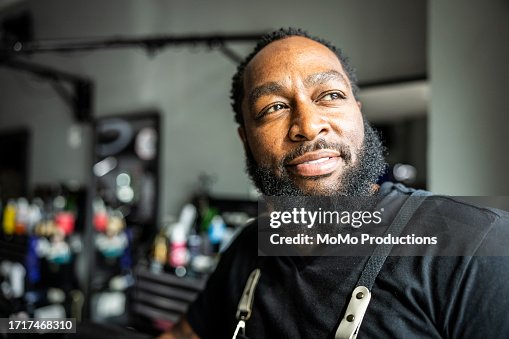 Portrait of proud barbershop owner in his shop Portrait of proud barbershop owner in his shop