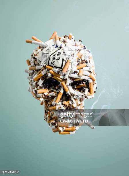 skull made from cigarettes , smoking - smoking death stock pictures, royalty-free photos & images