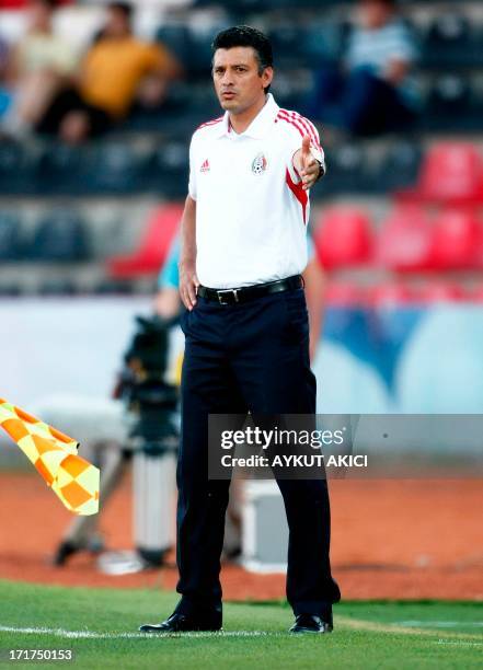 Mexico's coach Sergio Almaguer gestures during a group stage football match between Mali and Mexico at the FIFA Under 20 World Cup on June 28, 2013...