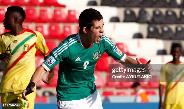 Mexico's Marco Bueno celebrates after scoring a goal during a group stage football match between Mali and Mexico at the FIFA Under 20 World Cup on...