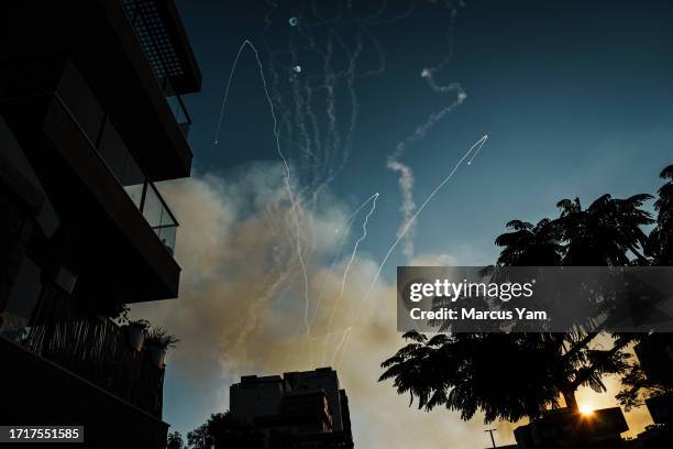 Hamas rockets are intercepted by counter-battery fire from the Iron Dome over the skies of Ashkelon, Israel, Tuesday, Oct. 10, 2023. Last week,...