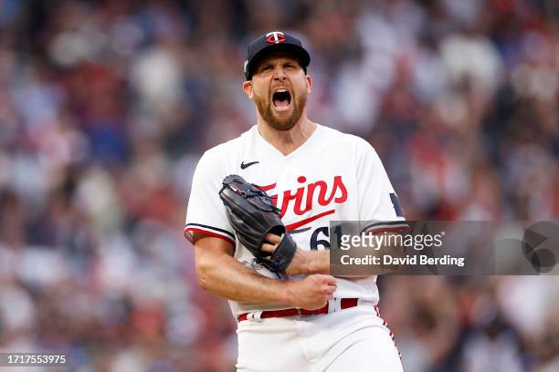 Brock Stewart of the Minnesota Twins reacts after striking out Brandon Belt of the Toronto Blue Jays during the seventh inning in Game Two of the...
