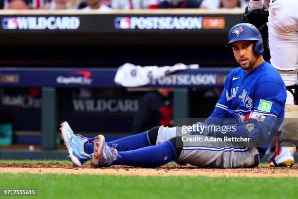 George Springer of the Toronto Blue Jays reacts to a wild pitch against the Minnesota Twins during the seventh inning in Game Two of the Wild Card...